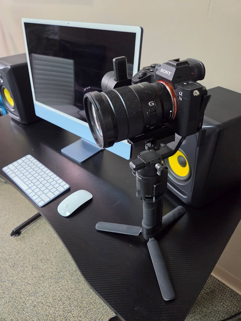 Camera and gimbal rig set up on the studio desk